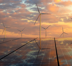 clean energy concept, photovoltaic panels and wind turbines in the light of the rising sun Photovoltaik- und Windkraftanlagen