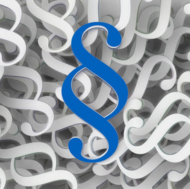 Paragraph Blaues Paragraphenzeichen auf mehreren weißen Paragraphenzeichen